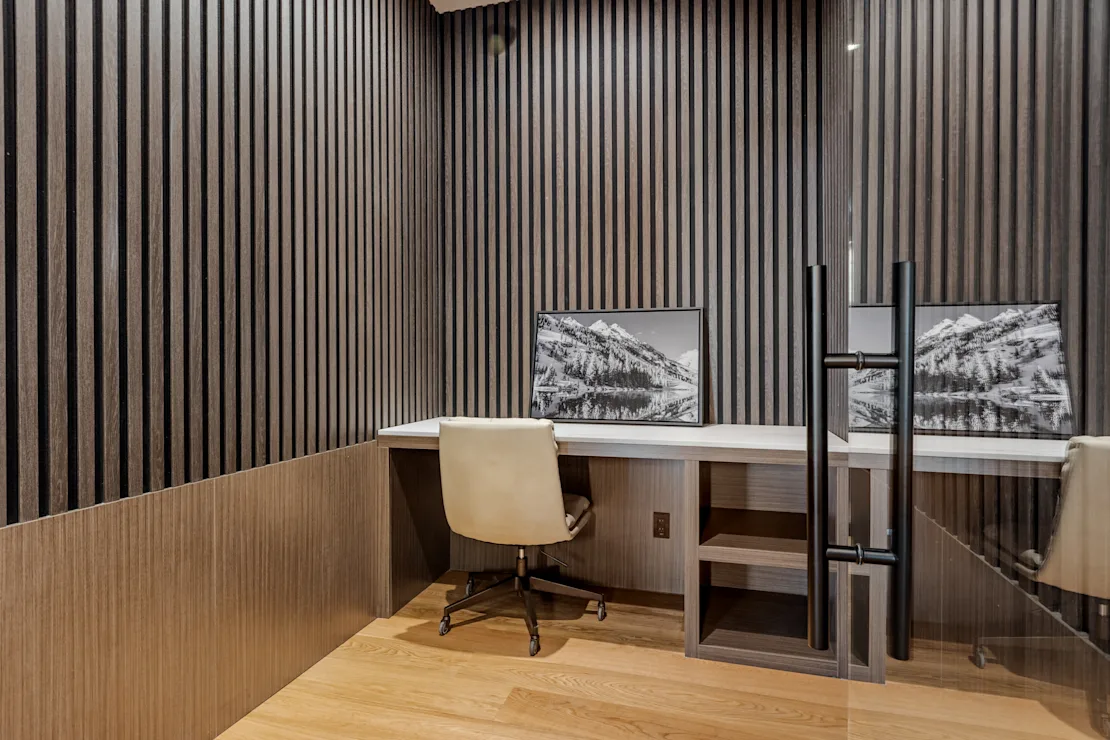 Work nook with a desk and chair in a suite