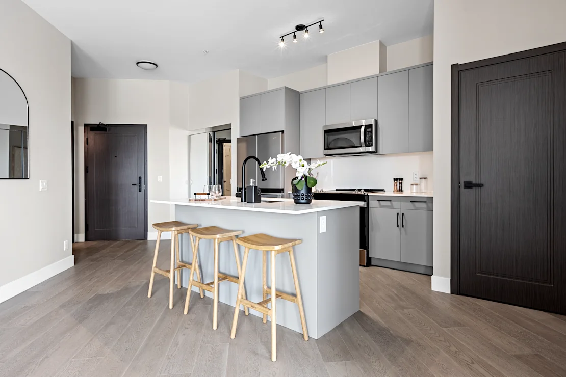 Kitchen counter with a bar stool